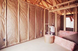 Insulation being installed in a new build home