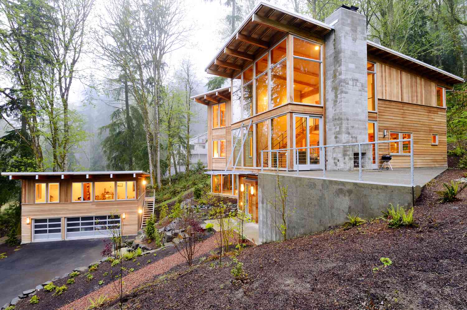 A house and a guest house, both with cedar siding.