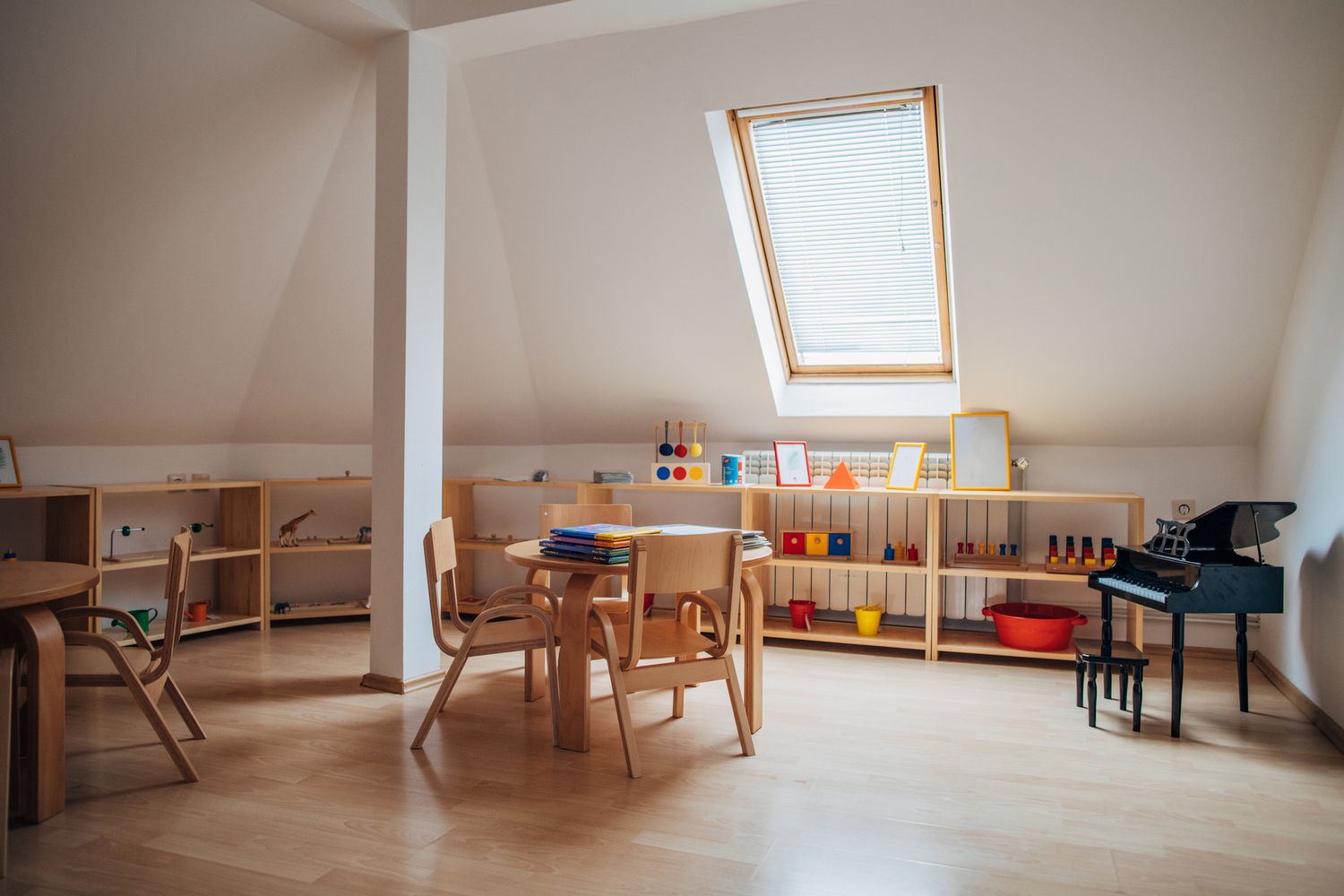 A kids play room with a skylight.